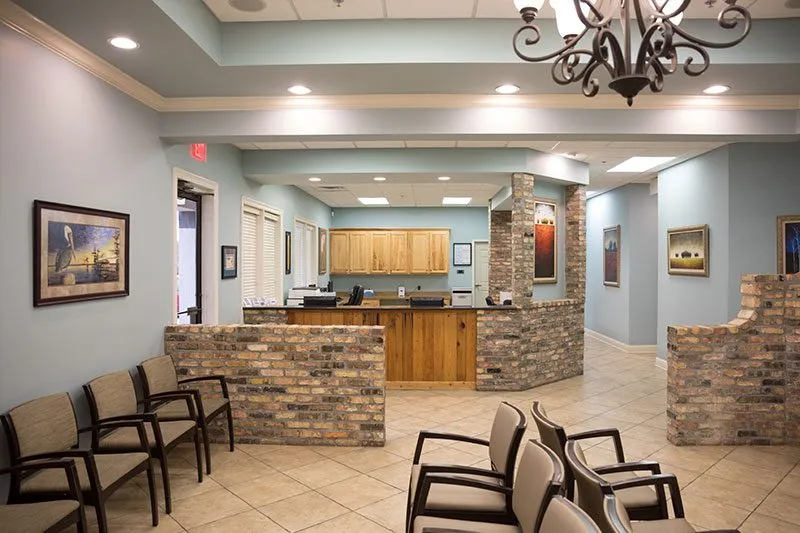 Front desk and waiting area at Louisiana Dental Center Covington